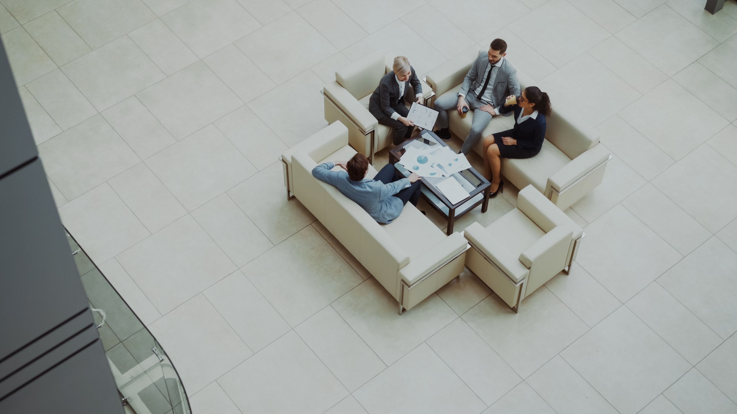 Aerial view of a business meeting in a modern office
